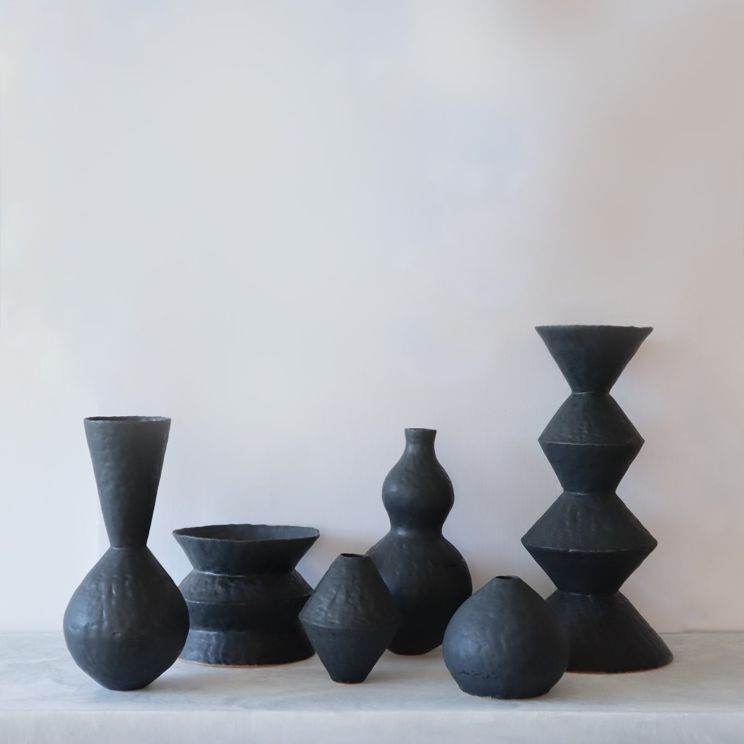 Coal Black Sphere with Funnel
