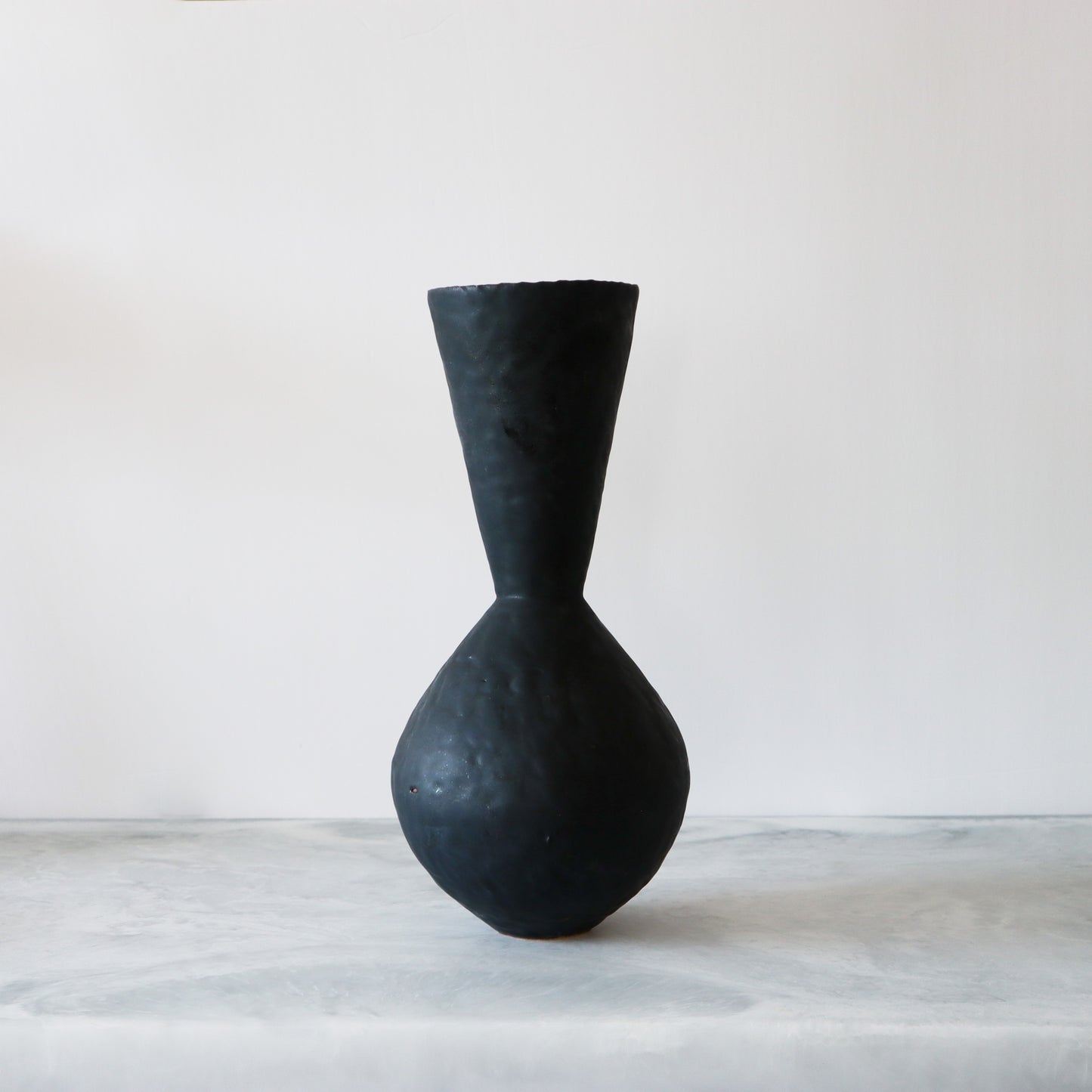 Coal Black Sphere with Funnel