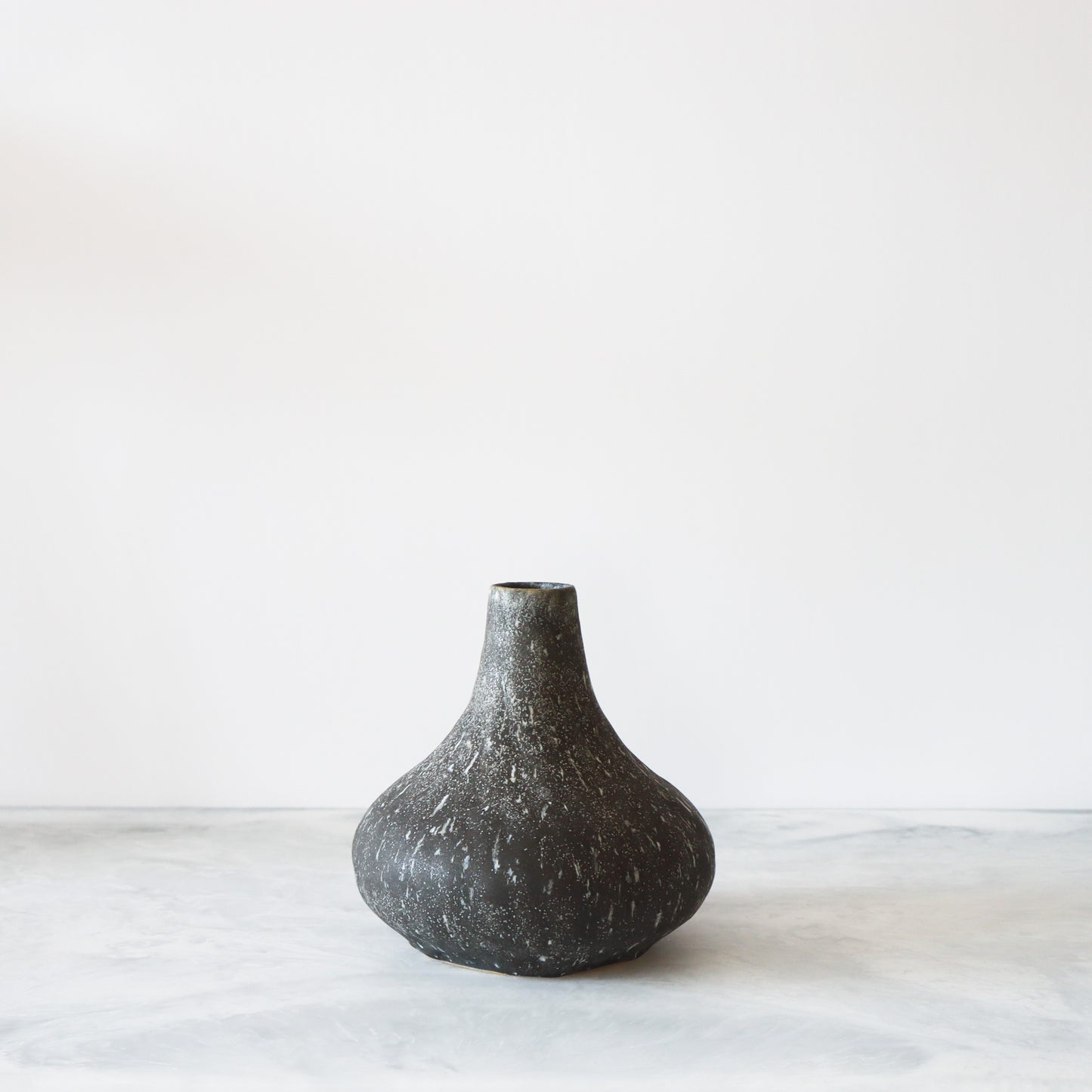 Mottled Black Droplet
