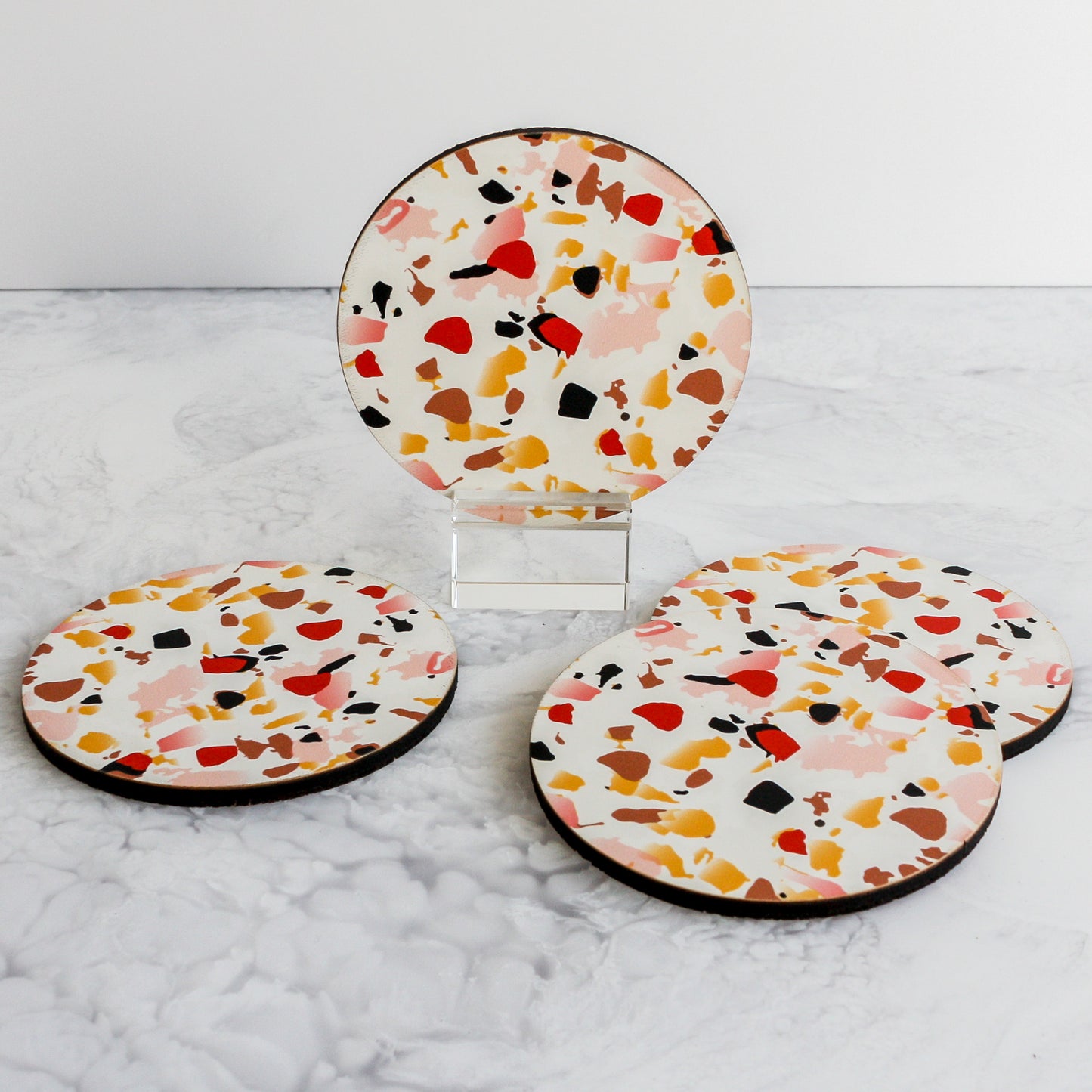 Terrazzo coasters in coral