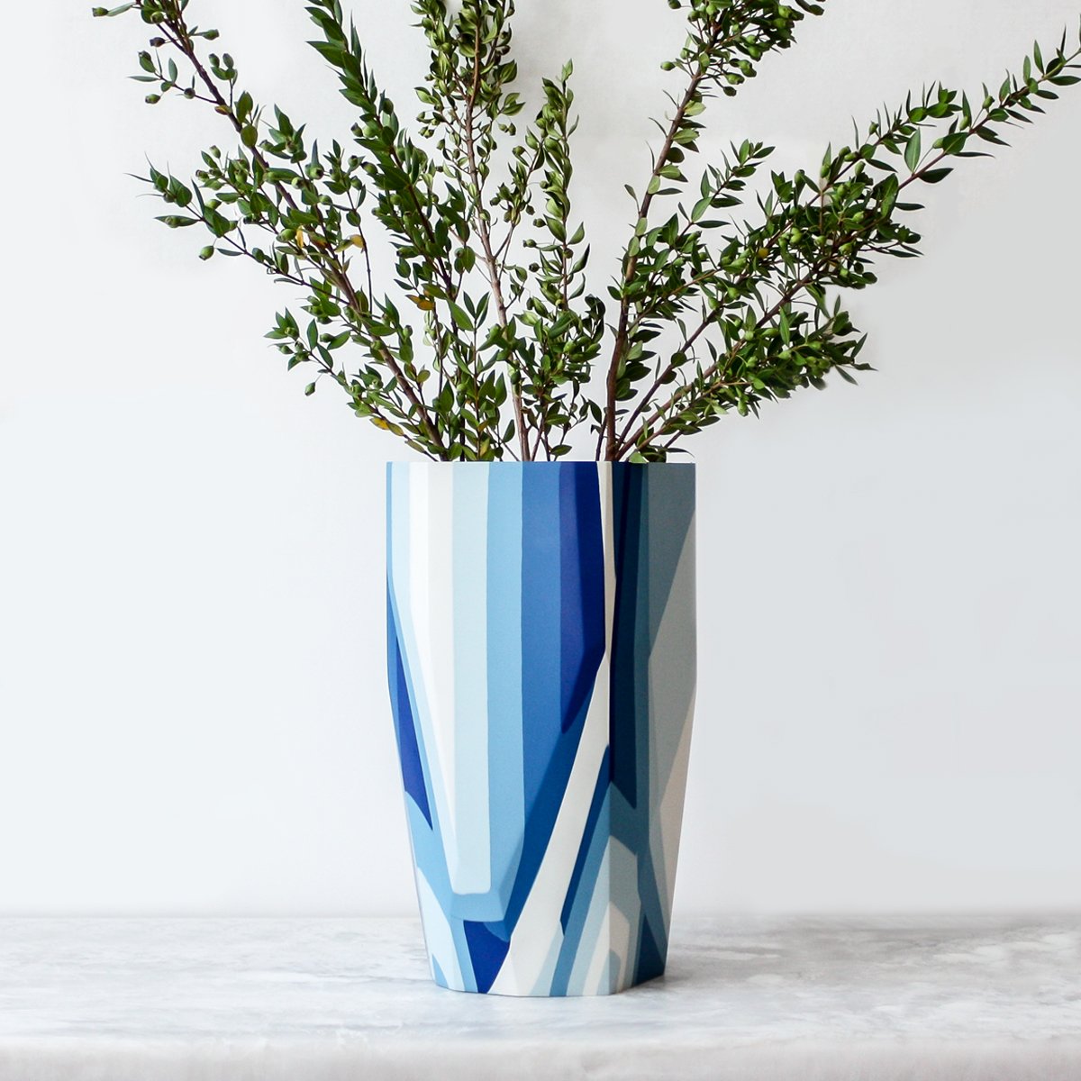 Lands End Vase made of resin and plaster in shades of blue by Anyon and Elyse Graham