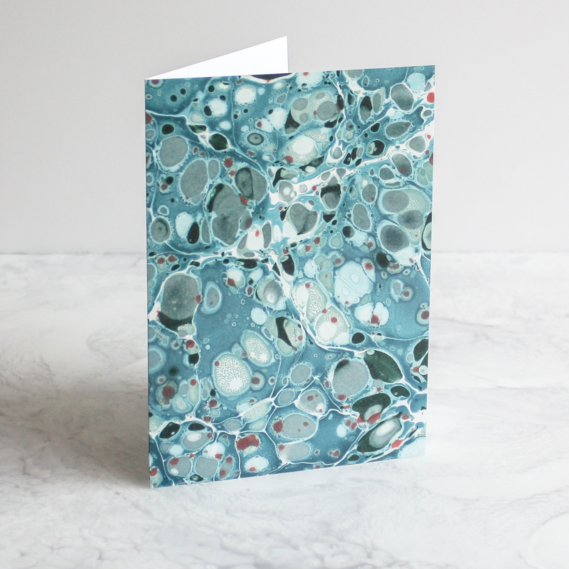 Marbleized greeting cards in sea dazzle blue