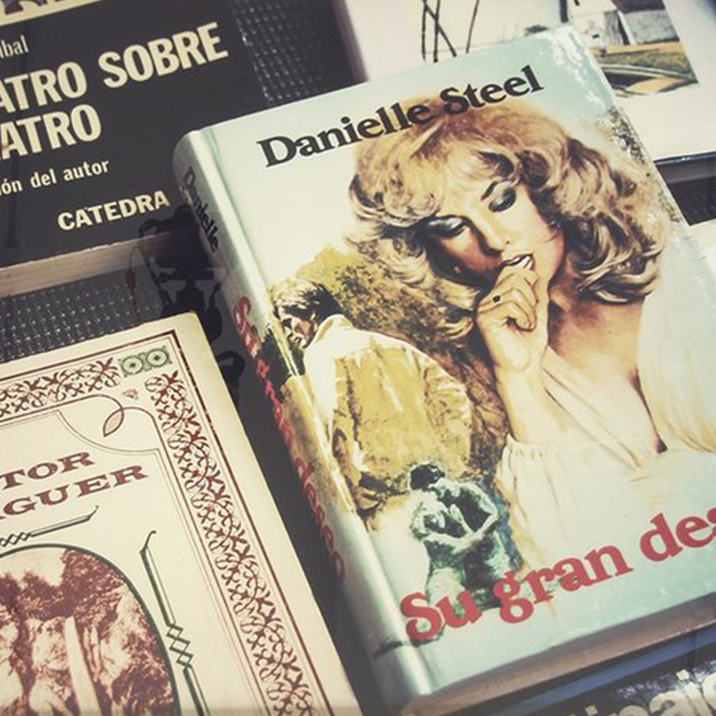 Photograph by Sara Ferguson titled Barcelona, Spain of books, such as, Danielle Steel