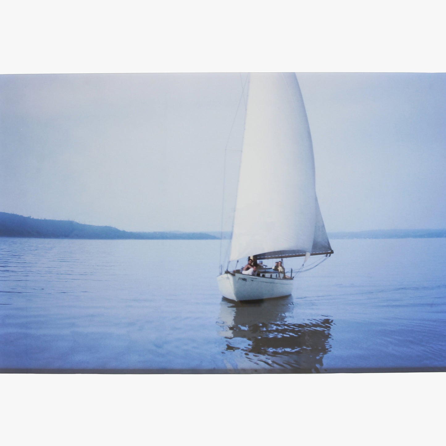 Blue Sailboat photograph by Sara Ferguson