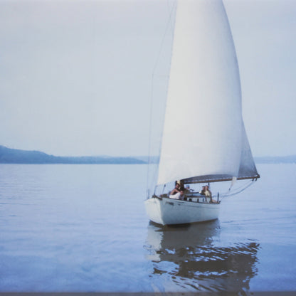 Blue Sailboat photograph by Sara Ferguson