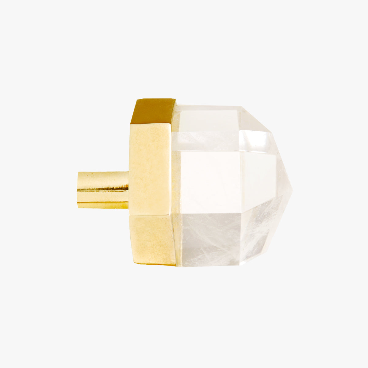 Thea knob handmade in clear quartz crystal and polished brass by Matthew Studios