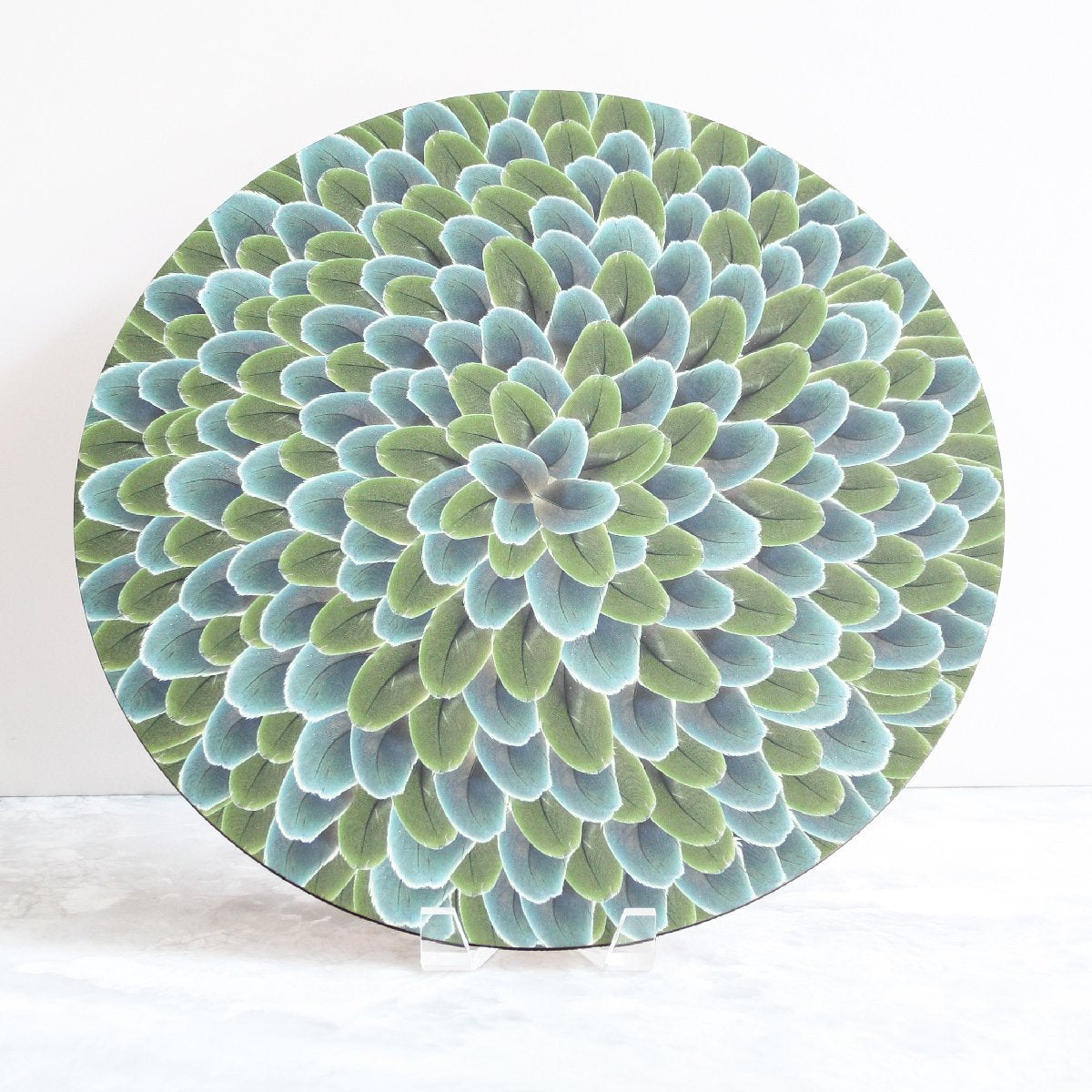 blue lady amherst pheasant feathers placemat made with cork and wood in blue and green by Tisch New York