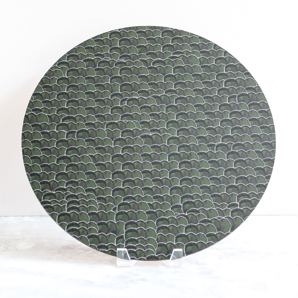 lady amherst pheasant feathers placemat made with cork and wood in forest green by Tisch New York