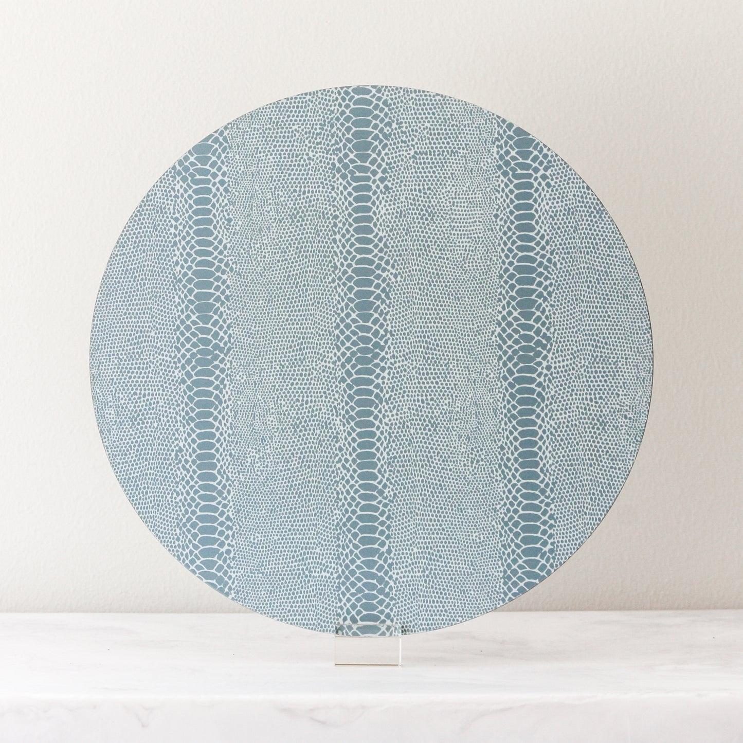snake print placemats in light blue gray made of cork and wood by Tisch New York