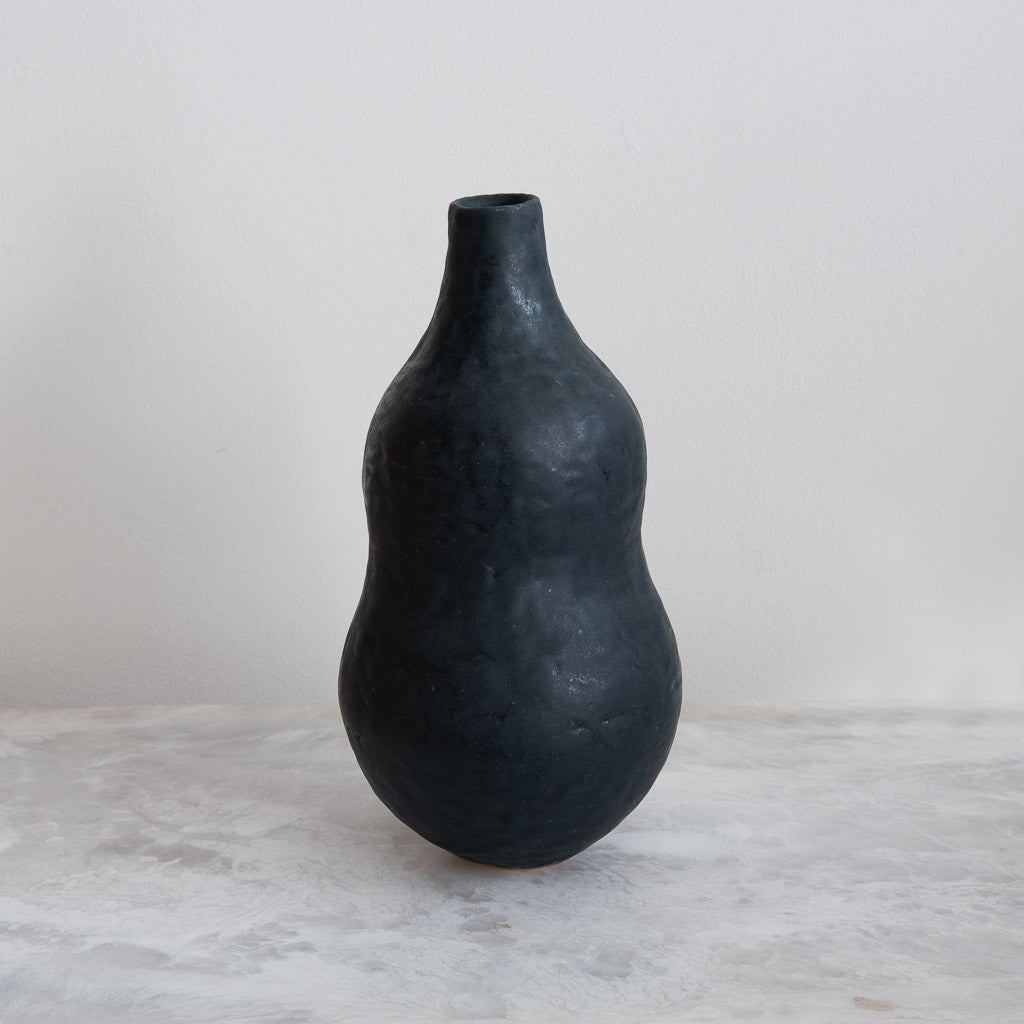 Coal Black Curve Bottle