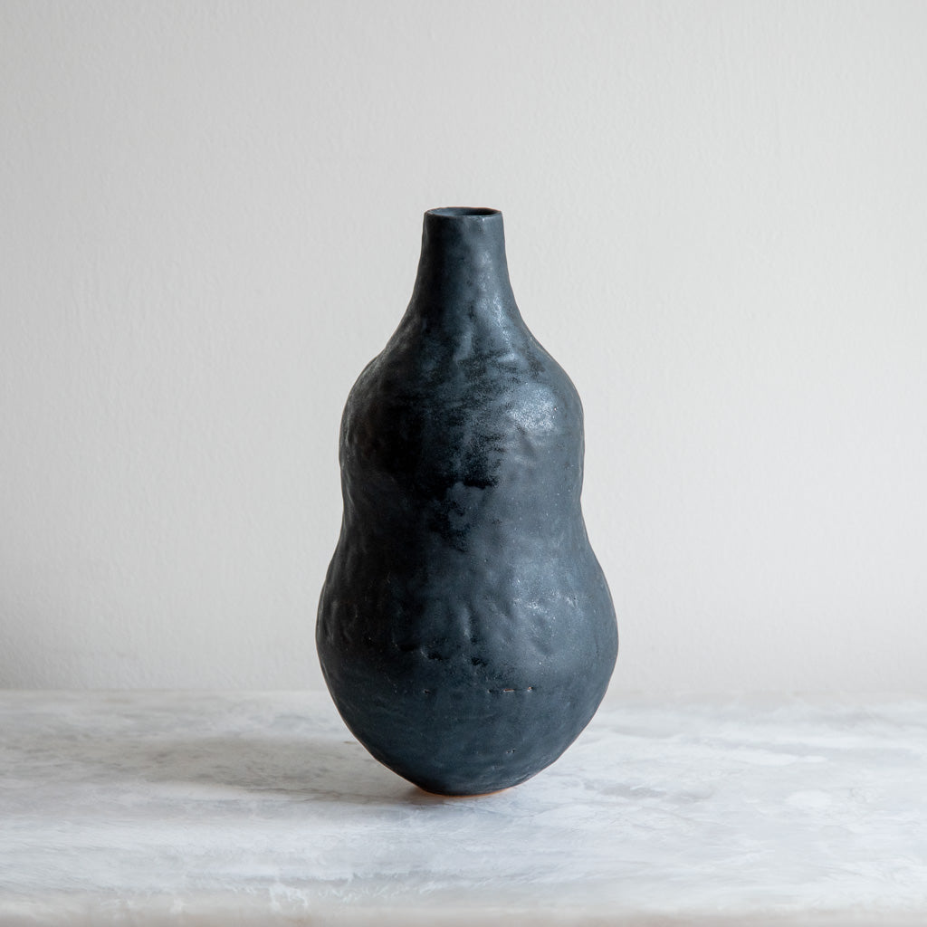 Coal Black Curve Bottle
